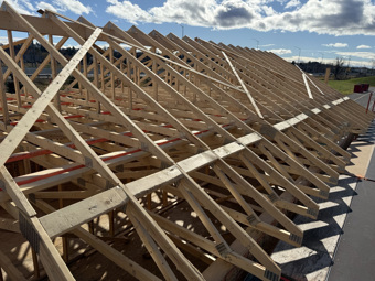 the interior of a roof being built with all the scaffolding set up